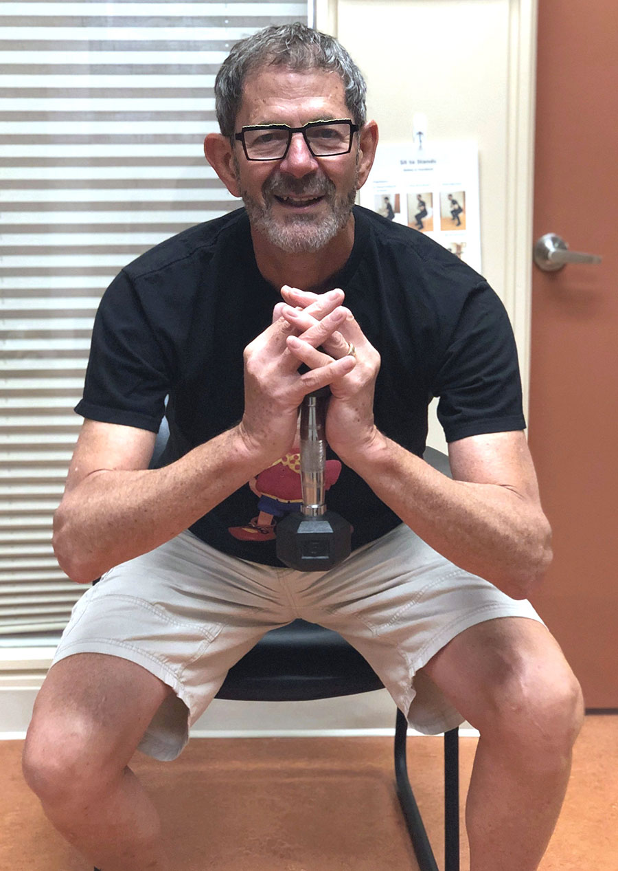 InsideOut Physiotherapy GLAD Exercise holding weight InsideOut Physiotherapy GLAD Exercise holding weight