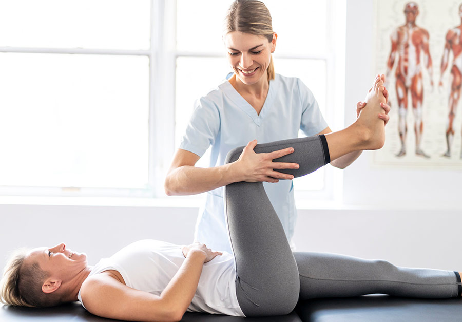 Physiotherapy-services girl with therapist